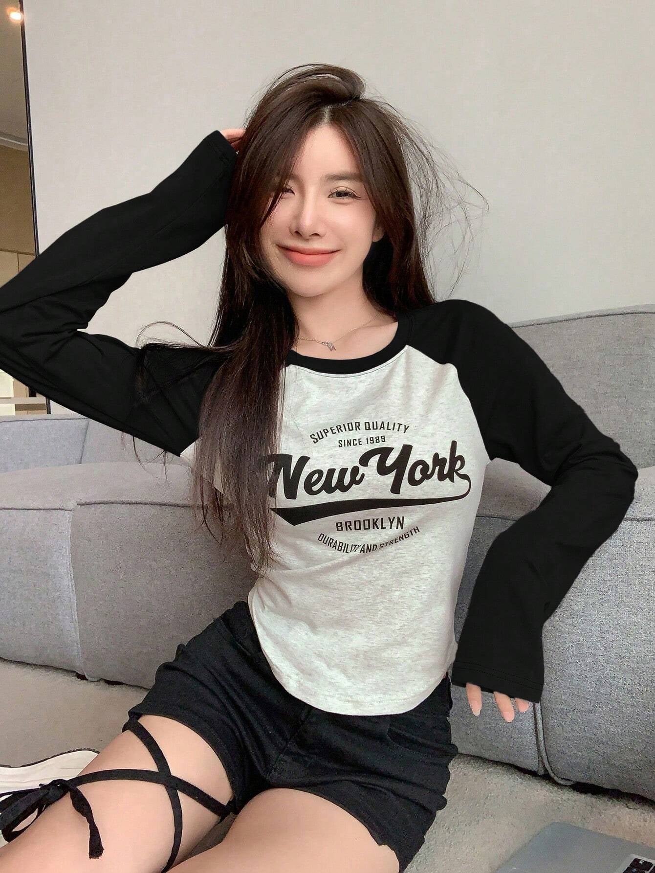 Contrast Raglan Sleeve Letter Graphic Curved Hem Tee